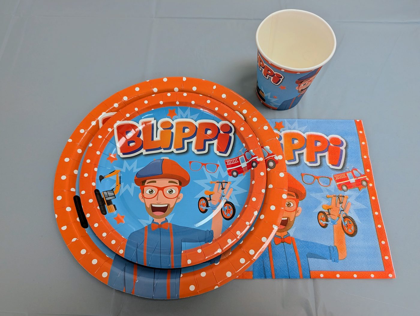 Blippi theme plates, cups, and napkins