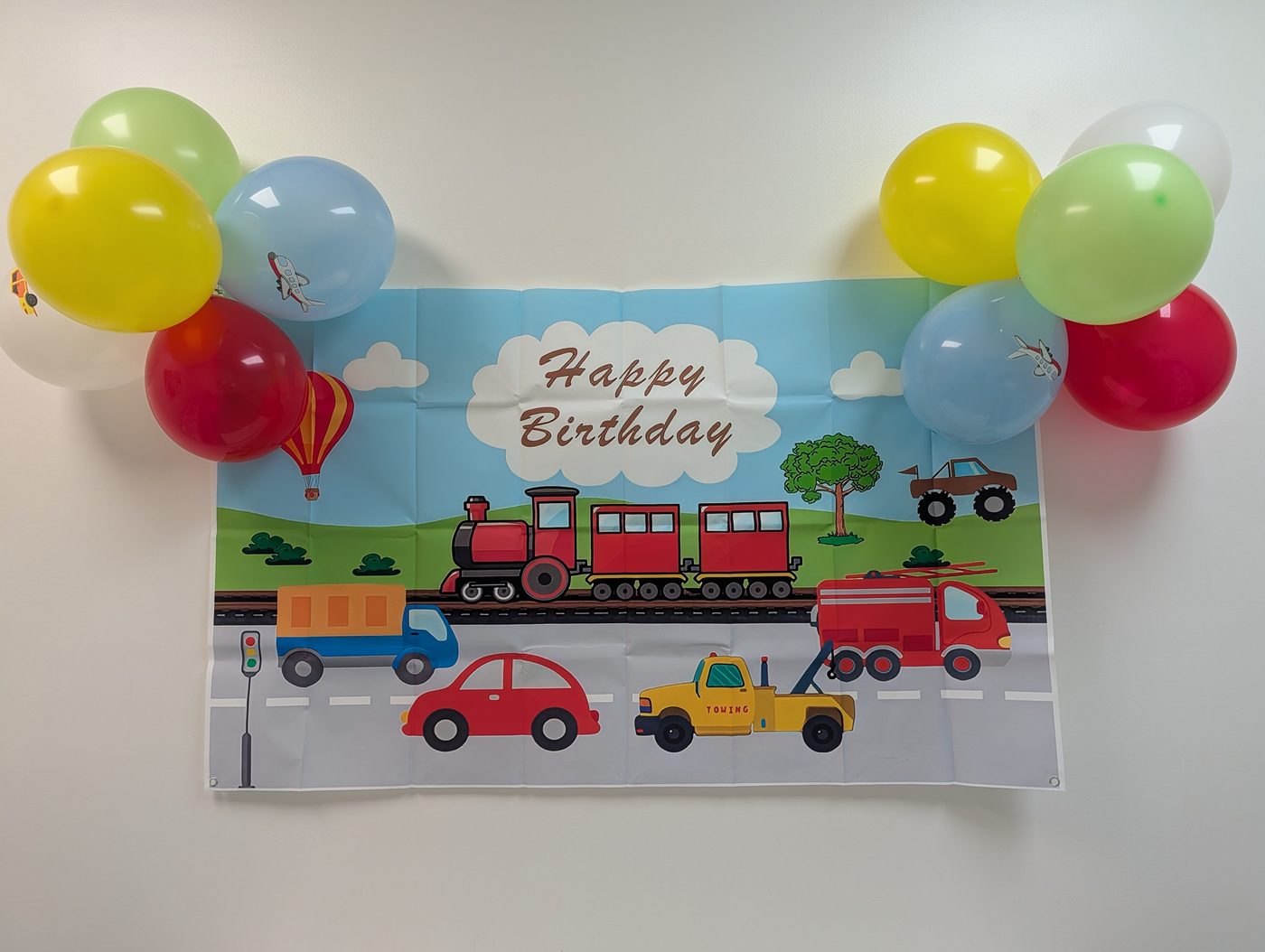 Transportation birthday banner with balloons